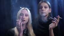 Girls Smoking close to each other