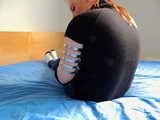 Lea wearing five very tight hose clamps on each arm