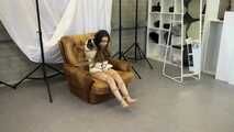 Rey Sanson bound and gagged in a shiny nylon Downjacket during a Fotoshooting