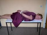 Hogtied on a table