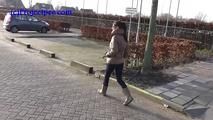 078014 Rachel Evans Pees Beside Her Car