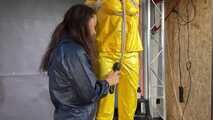 Aiyana and Myxxxy having fun together in shiny nylon Rainwear