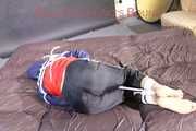 SANDRA tied, gagged and hooded with ropes on a bed wearing a supersexy oldschool rain jacket and a shiny nylon rain pants (Pics)