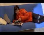 Mara sorting newspapers and lolling on the floor and the sofa wearing sexy shiny nylon downwear (Video)