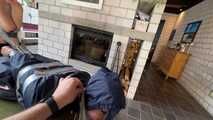 Rachel Adams bound and gagged by an Intruder in shiny Rainwear