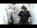 Get 2 Videos with Dani bound and gagged in shiny nylon Downwear from 2008.