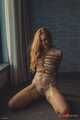 Ariel in armbinder