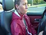 Watch Sandra taking a Walk during very hot Weather enjoying her rubberized oldschool Rainsuit