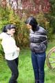 Jill ties her friend in shiny downjackets