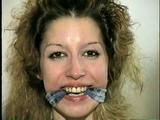 TAMARA IS MOUTH STUFFED, CLEAVE GAGGED, OTM GAGGED, HANDGAGGED & DOES LOTS OF GAG TALKING (D51-7)