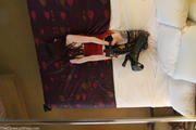 Devin: Goth Girl in red Cuffs  