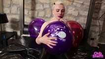 470 Chrissy pops 3 of her logo balloons