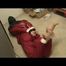 03:45 min. video with Shelly tied and gagged barefeet with shiny nylon rainwear in a cellar