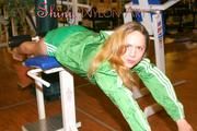 Leonie in an fitness studio wearing sexy shiny nylon shorts and a rain jakcet (Pics)