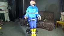 Sexy Pia being tied and gagged with ropes and a cloth gag on a hairdressers chair wearing a sexy blue shiny nylon rainpants and a lightblue downjacket (Video)