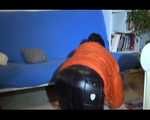 Mara sorting newspapers and lolling on the floor and the sofa wearing sexy shiny nylon downwear (Video)