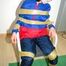 Katharina tied by using tape, gagged and hooded on a chair wearing sexy red/blue rainwear (Pics)