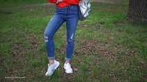 Pretty Kate is smoking Marlboro Red 100s in the park