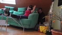 Lisa roped on couch 1/2