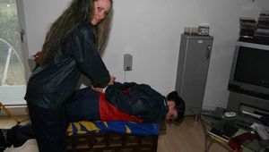 Get 246 Pictures with Jill and friends tied and gagged in shiny nylon rainwear from 2005-2008!