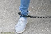 Cuffed to a heavy container