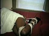 26 YR OLD BLACK BANK TELLER IS HOG-TIED, CLEAVE GAGGED AND HANDGAGGED WHILE STRUGGLING ON THE BED (D52-12)