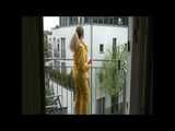 Get 2 Videos with Monika enjoying her Shiny Nylon Rainwear from our 2010 Archive