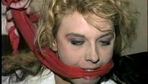 LEATHER SKIRT, HOG-TIED, TOE-TIED, MOUTH STUFFED HOSTAGE (D17-18)