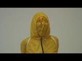 03:00 Min. video with Jill tied and gagged in a shiny nylon yellow rainsuit