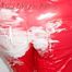 Lucy wearing a sexy red shiny nylon jumpsuit during her shower (Pics)