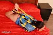 Elsa - captured, tape tied and hogtaped in trashbag