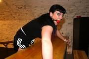 Jill tied and gagged in black shiny shorts