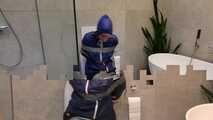Myxxxy surprised by an Intruder in her Bathroom finally bound and gagged in Rainwear