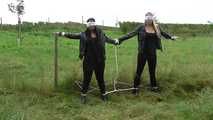 Jasmin & Larissa tied on fence Photoshoot