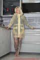 Miss Francine in yellow Schmuddelwedda raincoat