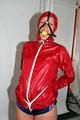 Alina tied and gagged in shiny nylon shorts and a shiny nylon cagoule