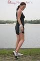 Enni outdoor wearing a sexy black shiny nylon shorts and a black top (Pics)