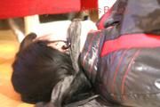 Mara tied and gagged on a bottom-up table wearing a supersexy black/red downwear combination (Pics)