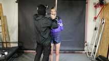 Myxxxy tied and gagged in shiny nylon Shorts and Windbreaker