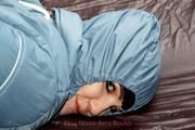 Jill tied and gagged in a shiny nylon oldschool skisuit