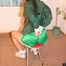 Beautiful archive girl tied and gagged on an chair wearing sexy shiny nylon shorts and a green down jacket (Pics) 