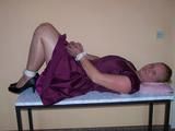 Hogtied on a table