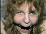 19 Yr OLD SINGLE MOM RONI IS HOME MADE RING GAGGED, HANDS TIED BEHIND HER HEAD & TIED UP SITTING BACKWARDS TO A CHAIR (D50-10)