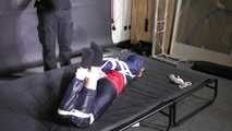 Marie bound and gagged in shiny nylon Rainwear