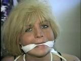 BLONDE BOMBSHELL TRACY IS SPONGE STUFFED AND CLEAVE GAGGED (D36-8)