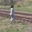 033022 Renee Picks A Bad Moment To Pee By The Railway