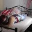 Mystique hogtied on bed 1/2
