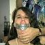 34 Yr OLD LATINA HOUSEKEEPER WITH BIG TITS IS BEING HELD HOSTAGE & IS MOUTH STUFFED WITH SPONGE & RAG, TIED TO A CHAIR, CROTCH ROPED WHILE WEARING BLACK LACE TEDDY (D57-4)