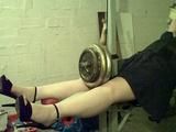 Sandra tied on a gym 1/2