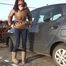 078014 Rachel Evans Pees Beside Her Car